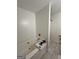 Luxurious bathroom with a soaking tub, gold fixtures, and sleek tile flooring for a spa-like experience at 7050 Galloway Pt, Riverdale, GA 30296