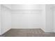 Walk-in closet with shelving and carpeted floor at 1875 Cutleaf Creek Rd, Grayson, GA 30017