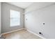Laundry room features tile flooring and storage shelving at 1875 Cutleaf Creek Rd, Grayson, GA 30017