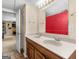 Bathroom featuring double sinks and an attached finished basement at 230 Cobblestone Ln, Mcdonough, GA 30252