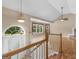 Bright, open foyer with hardwood floors, a vaulted ceiling, and abundant natural light at 230 Cobblestone Ln, Mcdonough, GA 30252