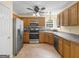 Kitchen featuring stainless steel refrigerator, stove, microwave, and dishwasher at 230 Cobblestone Ln, Mcdonough, GA 30252