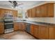 Kitchen showcasing stainless steel appliances, generous cabinet space and decorative backsplash at 230 Cobblestone Ln, Mcdonough, GA 30252