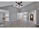 Open-concept layout showcasing the living room seamlessly connected to the kitchen and dining areas at 100 Riveredge Dr, Mcdonough, GA 30252