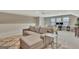 Comfortable bonus room with a sofa, an office area, and natural lighting at 411 Southbridge Pass, Peachtree City, GA 30269