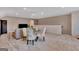 Large bonus room featuring ceiling fan, TV, with sitting and dining areas at 411 Southbridge Pass, Peachtree City, GA 30269