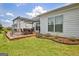 Outdoor deck with pergola, dining table and chairs, and lush green lawn at 411 Southbridge Pass, Peachtree City, GA 30269