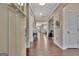 Inviting foyer with wood floors and neutral walls, leading into the home's main living spaces at 411 Southbridge Pass, Peachtree City, GA 30269