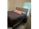 Cozy bedroom with a comfortable queen-sized bed and a large window for natural light, creating a relaxing retreat at 1063 Nw Cato Nw St, Atlanta, GA 30318