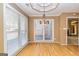 Cozy dining area featuring hardwood floors, neutral walls, and large bright windows at 195 Youngs Cir, Fayetteville, GA 30215