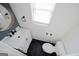 Stylish bathroom features a sleek vanity, round mirror, and modern fixtures at 1204 Bent Creek Dr, Mcdonough, GA 30252