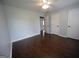 Spacious bedroom with hardwood flooring, ceiling fan, and closet space at 1204 Bent Creek Dr, Mcdonough, GA 30252