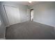 Light-filled bedroom with plush carpeting and closet space at 1204 Bent Creek Dr, Mcdonough, GA 30252