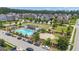 Overhead shot of community pool, playground, and surrounding manicured lawns at 206 Roundwood Way, Peachtree City, GA 30269