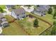 View of the large, fenced-in backyard including a concrete patio at 206 Roundwood Way, Peachtree City, GA 30269
