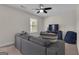 Bonus room with a couch, TV, and accent furniture at 206 Roundwood Way, Peachtree City, GA 30269