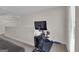 Upper level bonus room includes an exercise bicycle and weights at 206 Roundwood Way, Peachtree City, GA 30269