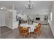 Open-concept dining area seamlessly connects to the kitchen and living room, perfect for entertaining at 206 Roundwood Way, Peachtree City, GA 30269