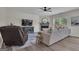 Cozy living room featuring fireplace and TV, ideal for relaxation at 206 Roundwood Way, Peachtree City, GA 30269