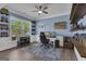 Stylish home office with custom built-in shelves, accent wall, and modern furnishings at 206 Roundwood Way, Peachtree City, GA 30269
