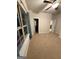 Neutral-toned bedroom featuring a ceiling fan and a large window at 442 Snow Owl Way, Lawrenceville, GA 30044
