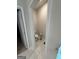 Cozy half bathroom with toilet and tile floors at 442 Snow Owl Way, Lawrenceville, GA 30044