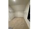 Bright walk-in closet featuring built in shelving at 442 Snow Owl Way, Lawrenceville, GA 30044