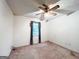 Bedroom with natural light, ceiling fan, and carpet at 1183 Iron Gate Blvd, Jonesboro, GA 30238
