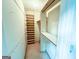 Walk-in closet with shelving and rod space for efficient storage at 1183 Iron Gate Blvd, Jonesboro, GA 30238