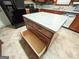 Kitchen island featuring drawers and open cabinet at 1183 Iron Gate Blvd, Jonesboro, GA 30238