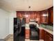 Spacious kitchen with ample cabinet space and modern appliances at 1183 Iron Gate Blvd, Jonesboro, GA 30238
