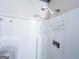 Clean, bright shower featuring an adjustable shower head and storage at 1183 Iron Gate Blvd, Jonesboro, GA 30238