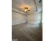 Large bedroom featuring a ceiling fan and tray ceiling, offering a comfortable retreat at 1317 Rosemary Ln # 65, East Point, GA 30344