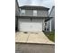 Spacious two-car garage with adjacent covered patio for easy access and outdoor enjoyment at 1317 Rosemary Ln # 65, East Point, GA 30344