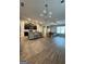 Inviting open-concept living space with modern flooring and kitchen island, perfect for entertaining at 1317 Rosemary Ln # 65, East Point, GA 30344