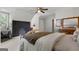 Large bedroom with stylish decor, workspace and a wall accent at 407 Calgary Dr, Peachtree City, GA 30269
