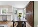 Dining room featuring table and seating, plus exterior access to yard at 407 Calgary Dr, Peachtree City, GA 30269