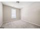 Cozy bedroom features neutral paint and carpet at 795 Lake Medlock, Alpharetta, GA 30022
