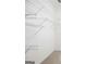 Walk-in closet features white wire shelving for optimal storage and organization at 795 Lake Medlock, Alpharetta, GA 30022