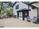 Back deck with grill, furniture and a nice view of the yard at 130 Emerald Dr, Mcdonough, GA 30253