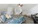 Spacious bedroom with carpet, a ceiling fan, and a cozy reading nook at 130 Emerald Dr, Mcdonough, GA 30253