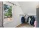 Neatly organized closet space with natural light and scenic outdoor views at 130 Emerald Dr, Mcdonough, GA 30253