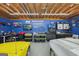 Well-equipped garage with ample storage, work benches, and classic cars, ideal for hobbyists at 130 Emerald Dr, Mcdonough, GA 30253
