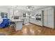 Well-lit kitchen boasts modern appliances, granite counters, and ample cabinet space at 130 Emerald Dr, Mcdonough, GA 30253