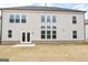 Backyard view of the home highlighting the yard, patio, and siding at 3468 Jasmine Sw Way, South Fulton, GA 30331