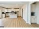 Modern kitchen with white cabinets, stainless steel appliances, and a center island at 3468 Jasmine Sw Way, South Fulton, GA 30331