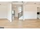 Bright, open-concept living space with beautiful wood floors and staircase at 3468 Jasmine Sw Way, South Fulton, GA 30331