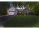 A charming home with a manicured lawn, garage, and inviting entryway at 305 Overland Trl, Temple, GA 30179