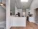 Kitchen featuring white cabinets, countertops, and stainless steel appliances at 305 Overland Trl, Temple, GA 30179