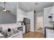 Bright kitchen featuring stainless steel appliances, modern cabinets, and a double sink at 305 Overland Trl, Temple, GA 30179